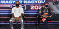 Formel-1-Piloten Lewis Hamilton und Max Verstappen bei einer Pressekonferenz