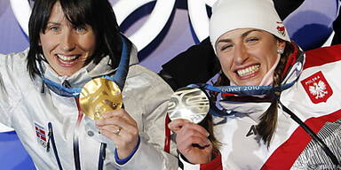Kowalczyk mit gequältem Lächeln neben Konkurrentin