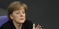 Angela Merkel will schnelleren Umstieg auf Öko-Strom
