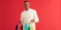Vergleichsportal - Teaser - Mann, roter Hintergrund, Shopping - 960x480