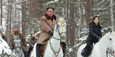 Kim reitet auf heiligen Berg