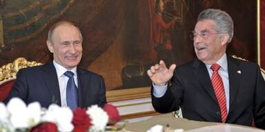 putin-fischer_epa